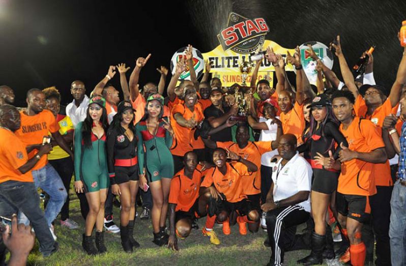 FLASHBACK:Guyana Football Federation Stag Beer Elite League Genesis winners Slingerz FC celebrate following their 3-2 triumph over Alpha United at the Leonora facility in June,.
