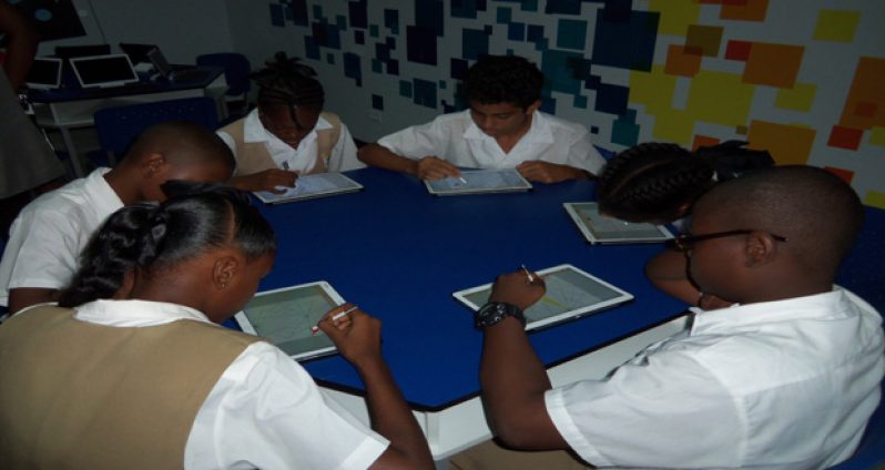 Students of North Ruimveldt Multilateral School  during an interactive session in a newly refurbished Samsung ‘Smart Classroom’