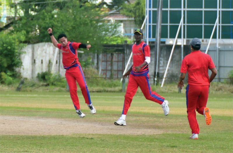 Lower Corentyne pacer Niall Smith celebrates the dismissal of one of his six victims yesterday at the GCC ground, Bourda. (Adrian Narine photo)