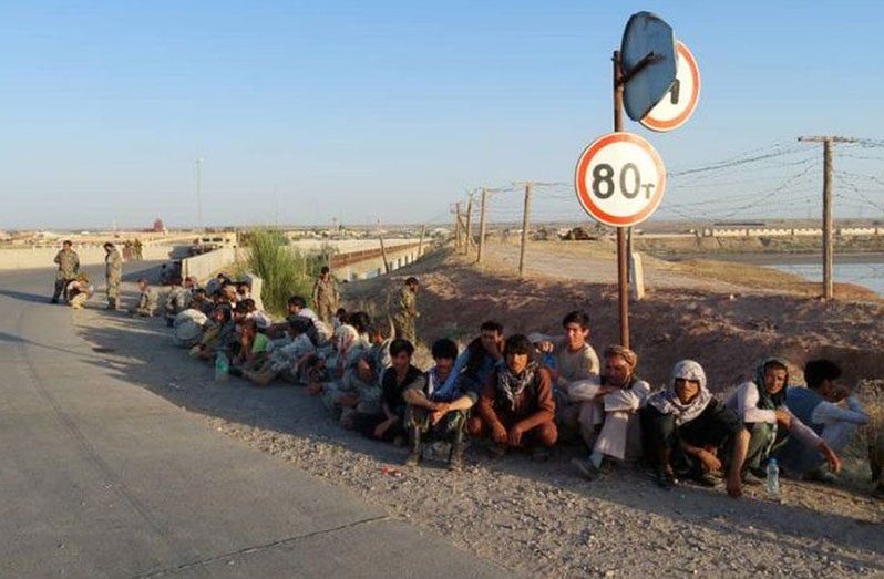 This group of Afghan soldiers fled to Tajikistan in June (BBC photo)