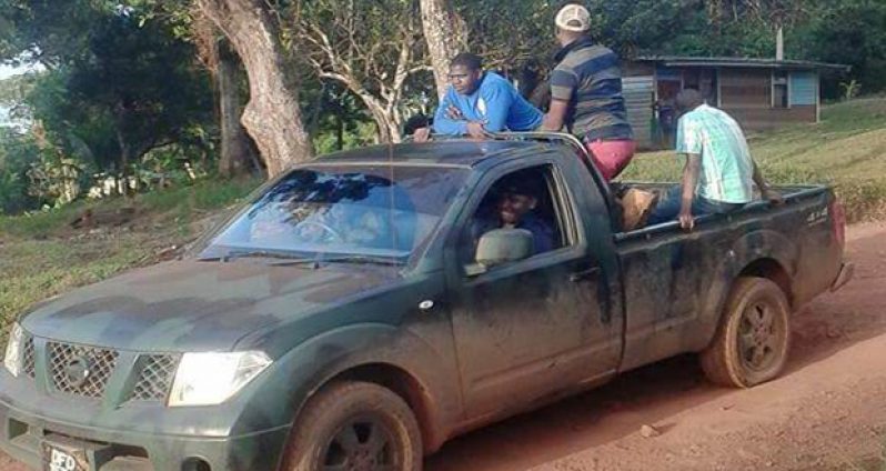 The Guyana Defence Force vehicle with army ranks as it was blocked from
leaving the community on Sunday morning