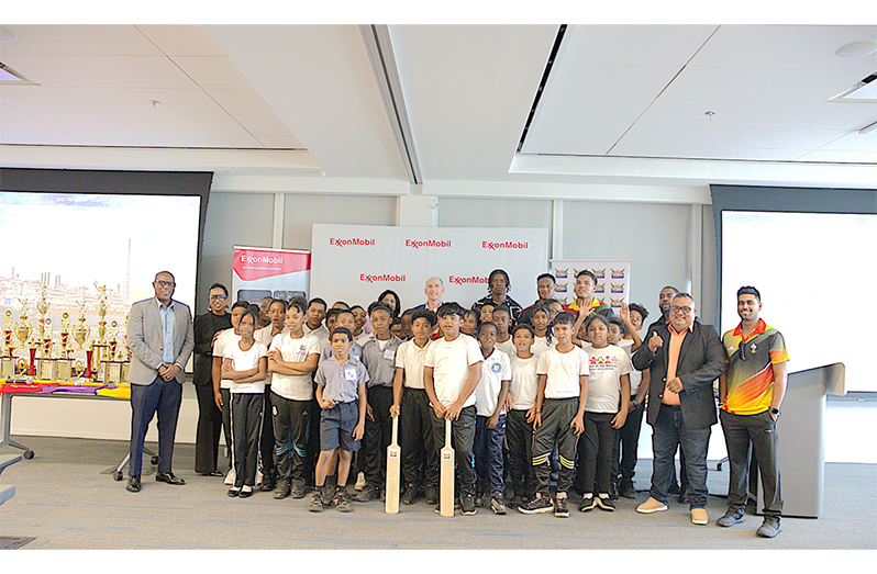 Minister Sonia Parag, ExxonMobil Guyana’s President Alistair Routledge, Director of Sport Steve Ninvalle, along with other officials, teachers and pupils at the launch on Friday