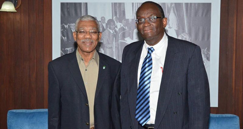 President David Granger and Guyana's Ambassador-designate to South Africa, Dr. Cecil Kenrick Hunte at the Ministry of the Presidency. (Ministry of the Presidency photo)