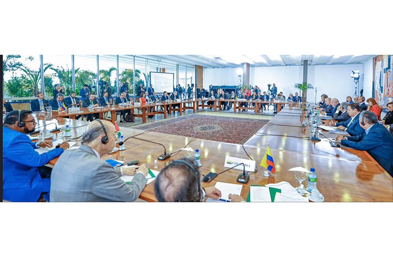 President Dr Irfaan Ali ( seated at left) at the meeting of the Presidents of South American Countries (Office of the President photo)