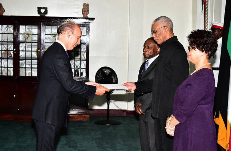 Ambassador Javier Maria Carbajosa Sanchez presenting his Letter of Credence to President David Granger in the presence of Minister of Foreign Affairs Carl Greenidge and Director-General in the Ministry of Foreign Affairs, Audrey Waddell. (MoTP photo)