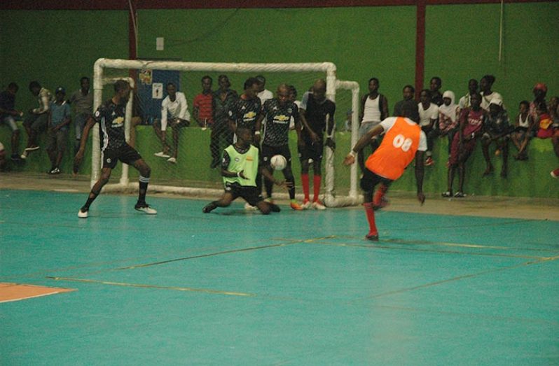 Part of the action in the clash between Sparta Boss and Tucville on Saturday at the National Gymnasium.
