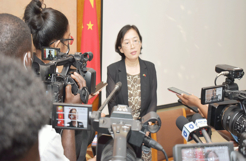 China’s Ambassador to Guyana, Guo Haiyan, speaks to reporters on Monday (Carl Croker photograph)
