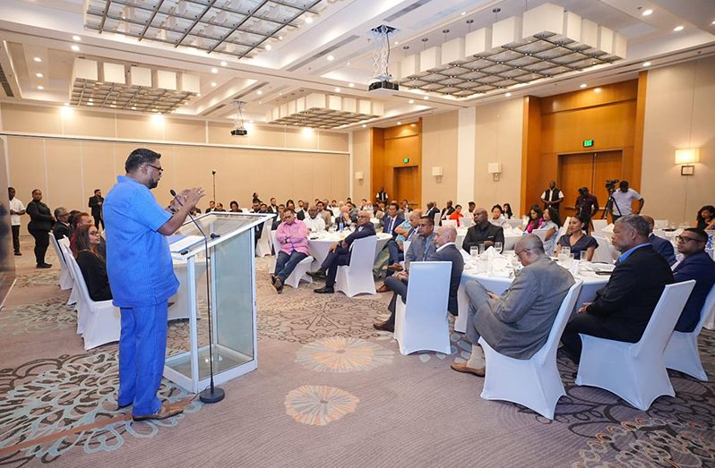 President Dr Mohamed Irfaan Ali speaking to the father Monday evening, during the Private Sector Commission’s (PSC) Corporate Dinner at the Guyana Marriott Hotel, Kingston, Georgetown