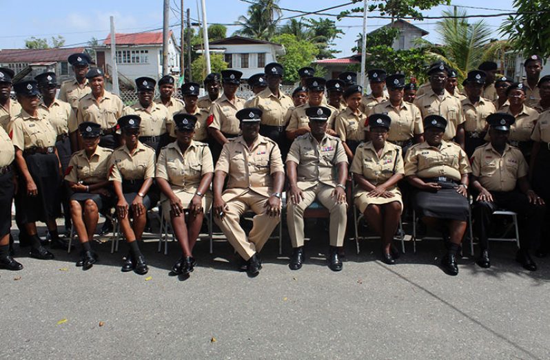 Fourth from right seated: Deputy Commissioner (Administration) Paul Williams and Special Superintendent Owen Trotz with ranks inspected on the parade