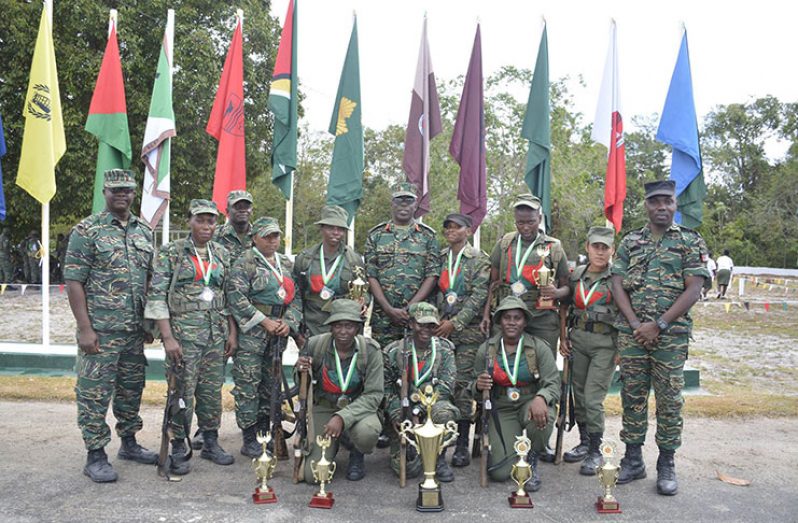 Chief-of-Staff Brigadier West (Centre) flanked by soldiers who were given awards for the fitness competition