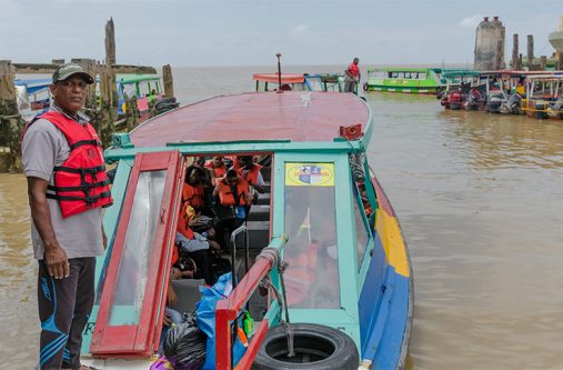Luknauth, one of a few speed-boat operators who are implementing precautionary measures to protect himself and passengers from the COVID-19 virus. (Delano Williams photo)