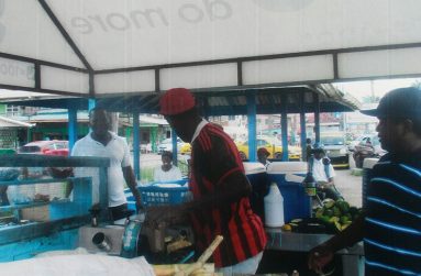 Charles attending to customers