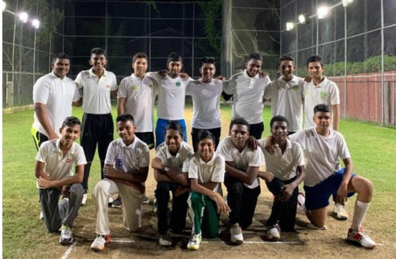 A happy bunch of players pose for the camera after an intense practice session New Trafford: From left, standing: Premkumar Permaul, Zachary Jodha, Jonathan Van Lange, Mavendra Dindial, Reyad Hussain, Nityanand Mathura, Gabriel Rookhum, and Alvin Mohabir. Stooping from left: Nicholas Shiopersad, Romeo Deonarain, Dave Mohabir, Arun Gainda, John Persaud, Stephon Sankar and Ravindra Singh. 