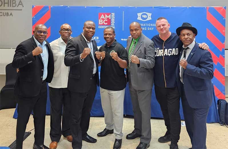 (From left) GBA President Steve Ninvalle poses alongside his Caribbean counterparts Vincent Straun of the Bahamas, Neil Roberts of Grenada, Shawn Blair of St. Maarten, Vice President Joseph Joefield of Trinidad, Edwin Bass of Curacao, and David Christopher of St. Lucia after the conclusion of the America Boxing Confederation (AMBC) Forum