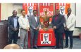 From left: Troy Peters (Petra Organisation), Deputy Chief Executive Officer Marti DeSouza, Paul Subryan (CEO of KFC Guyana), Troy Mendonca (Petra Organisation) and Franklin Wilson (Assistant Director of Sport) and the championship trophy at the launch on Wednesday evening (Japhet Savory Photo)