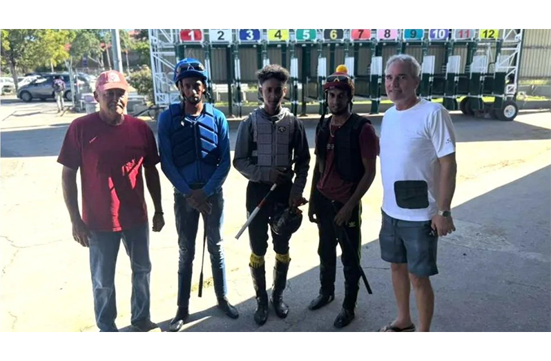 From left: Richard Dean, Jockeys Colin Ross, Yovin Kissoonchand and Ronaldo Appadu, and Robert Pierce
