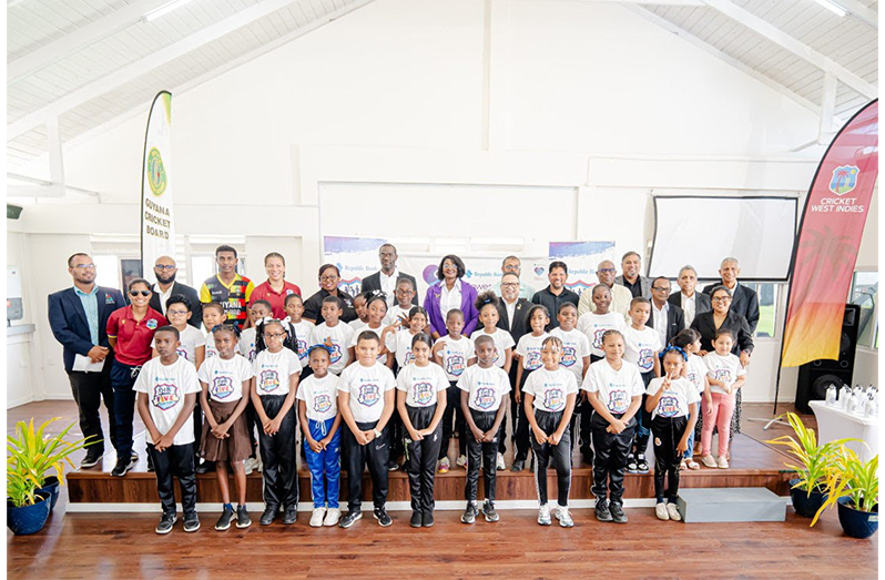 Back Row (Left to Right) - Nicholas Fraser, (Assistant Chief Education Officer- Allied Arts); Mandy Mangru, (West Indies Senior Women's Player); Anthony D'Andrade, (Cricket Operations Manager GCB); Riyad Latif, (Guyana Men's Cricketer) ; Cherry-Ann Fraser, (West Indies Senior Women's Player); Jonelle Dummett,Manager Marketing & Communications Republic Bank Guyana Limited); Reon King, (National Coordinator); Jannis London, (Manager, Human Resources Republic Bank Guyana; Bissoondyal Singh, (President, GCB); Saddam Hussain, (Chief Education Officer); Ramnaresh Sarwan, (fomer Guyana and West Indies captain); Steve Ninvalle, (Director of Sport); Brendon Ramlal (CWI Project Officer); Rabindranuth Saywack, (Marketing Manager, GCB); Ronald Williams, (Secretary, GCB); Davteerth Anandjit (Assistant Secretary, GCB); Lakshmi Singh, (Coordinator) with students from Winfer Gardens Primary, Stella Maris Primary and Redeemer Primary