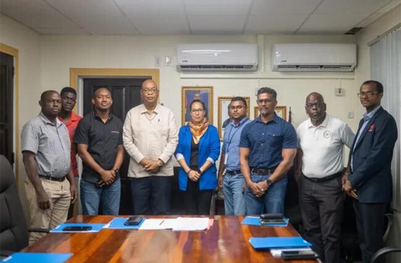 Minister of Public Works, Bishop Juan Edghill along with the newly appointed members of the Technical Standards Review Committee