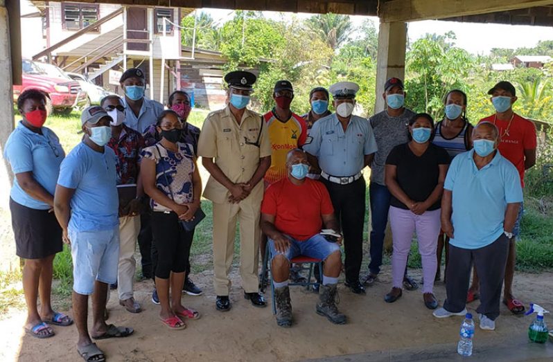 Commander Ramlakhan with the members of the recently-formed Baramita Station Management Committee.