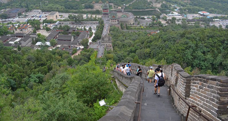 The steep stairs of The Great Wall as it snakes its way across the mountainous terrain