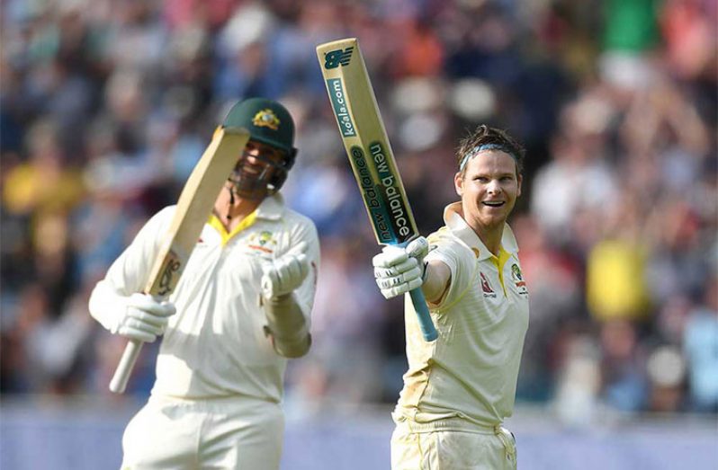 Steve Smith reaches his ton with No.10 Nathan Lyon. (Getty Images)