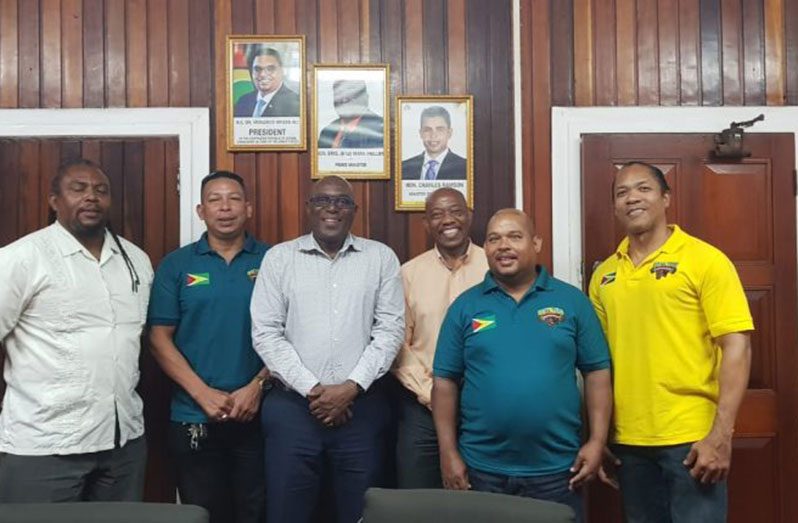 Director of Sport, Steve Ninvalle (centre), along with the Executives of the Guyana Amateur Powerlifting Federation