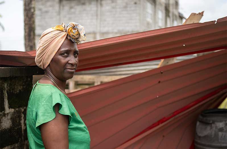 Collette Hinkson, a single mother and teacher of Kaneville, East Bank Demerara recalls being awakened in the early hours of Monday by a loud rumble, just moments before the roof of her home was torn off by a heavy wind (Delano Williams photos)