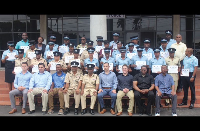 Seated at centre: Superintendent Jairam Ramlakhan and Assistant Commissioner Clifton Hicken flanked by facilitators and ranks who benefitted from the training course