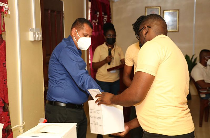 Minister of Housing and Water, Collin Croal, led the execution of a mining Lottery in Port Kaituma, Region One
