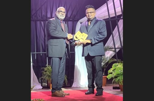 Lifetime achievement awardee, Neaz Subhan (left) receives the award from Mr Wazim Khan