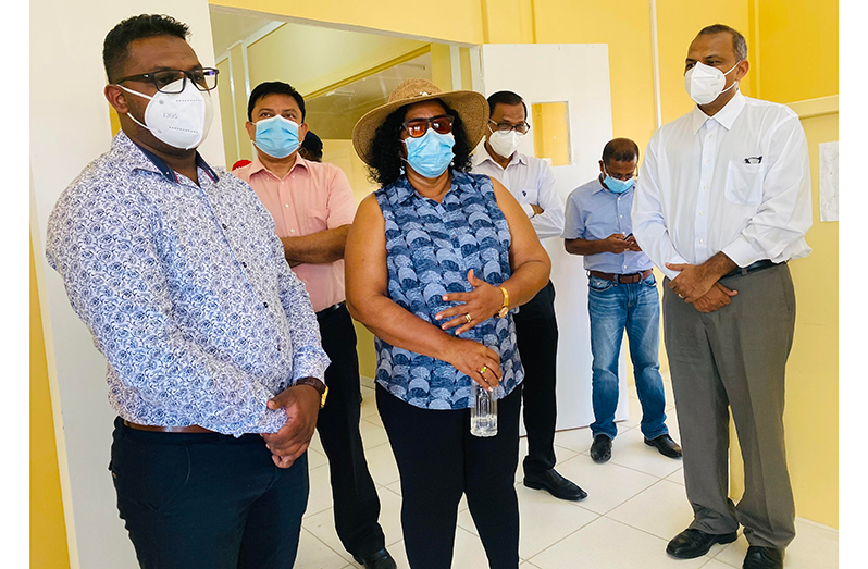 Minister of Health, Dr. Frank Anthony, speaking to the media on the plans for Region Two during his visit on Saturday. Also pictured are Regional Health Officer Dr. Ranjeev Singh (left) and Regional Chairperson Vilma De Silva (third from left)