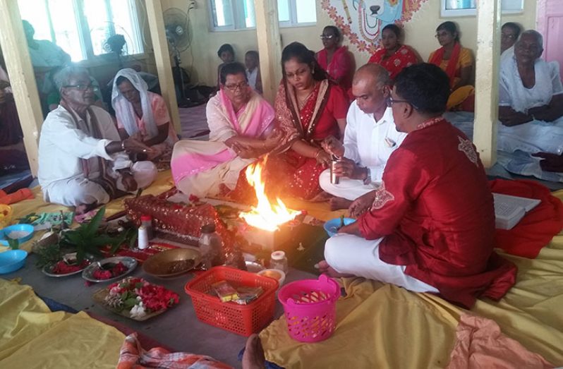 Members of the Golden Fleece Mandir performing puja in observance of Ramnavmi