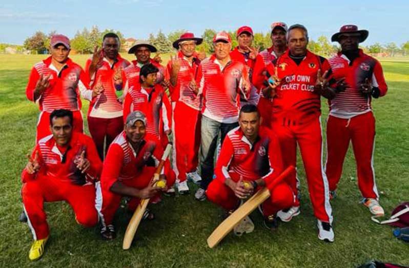 The victorious Toronto Blizzards side; Sunil Dhaniram and Jesh Parasnauth are stooping left and right respectively, with bats.