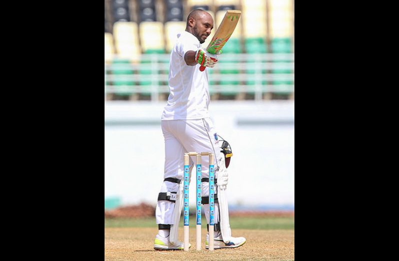 Sunil Ambris celebrates his fourth first class hundred on the second day of the opening four-day ‘Test’ against Sri Lanka yesterday. (Photo courtesy CWI Media)