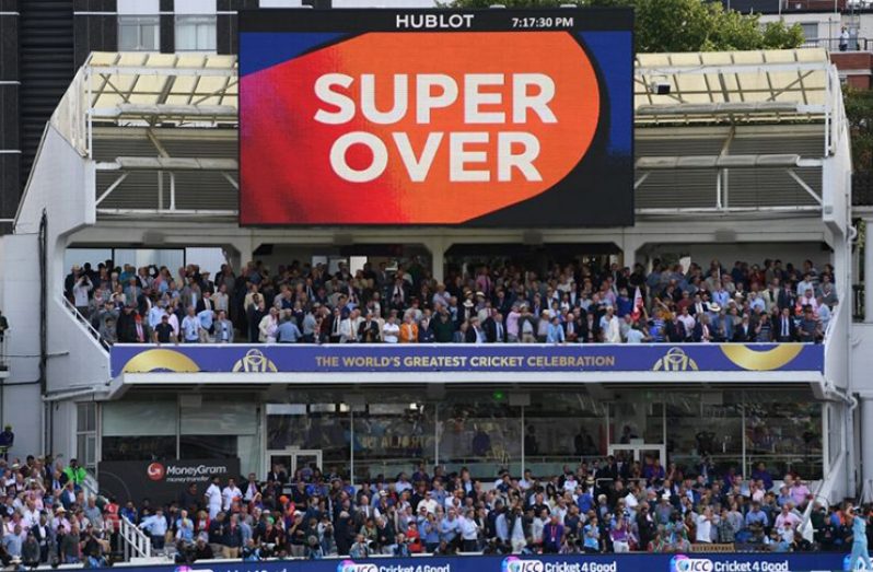 A sign signals the game is going to a Super Over .(Getty Images)