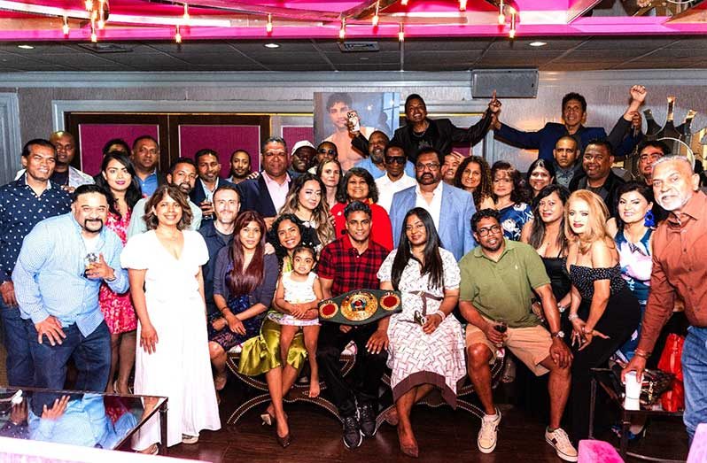 Dharry with family and supporters at the ceremony in New York