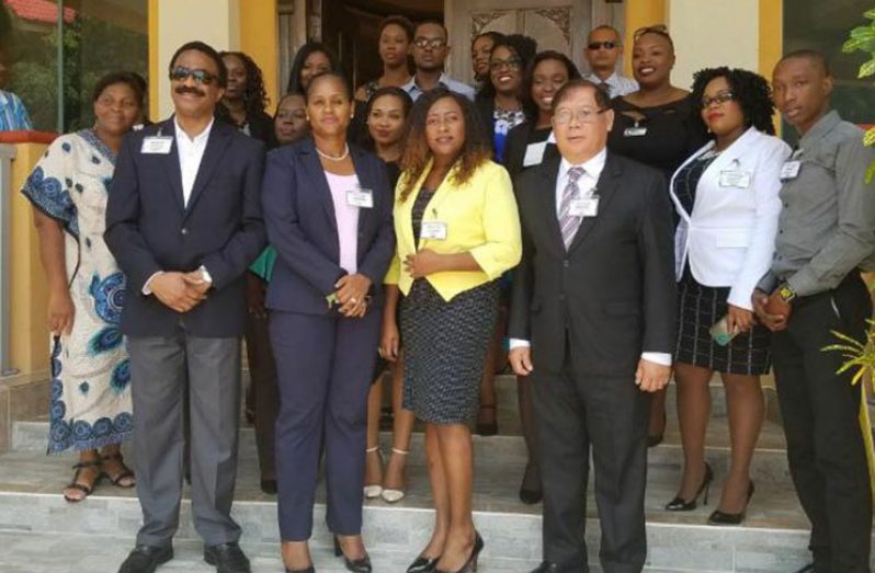 Attorney General Basil Williams SC, Martha Des Vignes, Solicitor General Kim Kyte, and Chief Parliamentary Counsel, Charles Fung-A-Fat SC (front row- Left to Right), stand with participants of the two-day seminar held at the Aruwai Resort  from August 25-27.