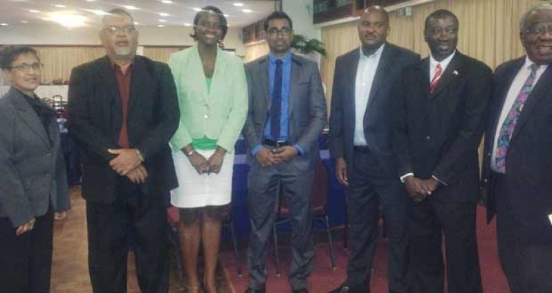 In photograph from left to right are:  Suriname’s Ambassador to Guyana, Ms. Mehroen Kurban-Baboe; Mr. Ramesh Dookhoo of the PSC; Ms. Uchenna Gibson of Go-Invest; Mr. Dhaneshwar Deonarine of MINTIC; Mr. Lance Hinds of the GCCI; Guyana’s Consul-General in Suriname Mr. Arlington Bancroft and Mr. Clinton Williams of the GMSA.
