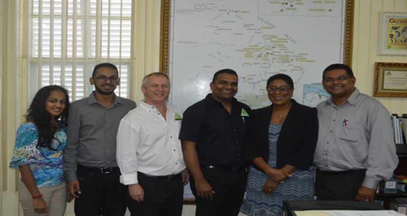 From right, Indranauth Haralsingh, Minister Cathy Hughes, Dinesh Ramlal, Nick Davies and  two Media personnel from Suriname