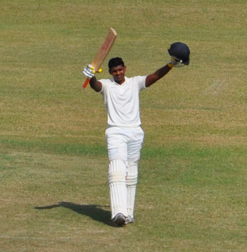 I did it, guys! Berbice opener Kandasammy Surujnarine acknowledges the applause of his teammates, after posting his maiden and the fourth century of the first-round matchup between Demerara and Berbice yesterday.