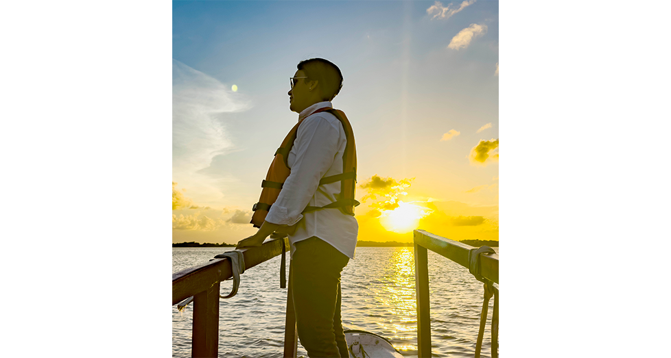 Susan R Minister of Tourism, Industry and Commerce, Susan Rodrigues captured at the golden hour, during a boat ride on the Demerara River in September (Photo by Japheth Savory photo)