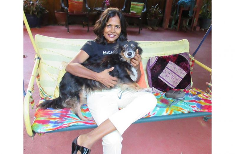 Syeada with Millie, one of her four dogs