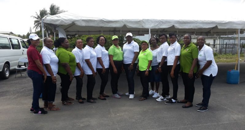 Senior Superintendent Maxine Graham (with cap, centre) and other members of the Guyana Association of Women Police pose for the Chronicle yesterday