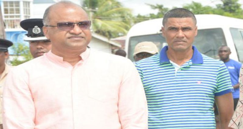 Businessman Shahab Hack and Commissioner of Police, Seelall Persaud in Agricola during one of their recent community activities