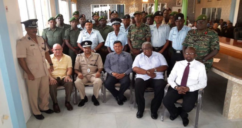 The graduates with, from left, front row: Assistantant Commissioner of Police, Mr David Ramnarine; Permanent Secretary in the Ministry of Labour, Mr Patrick Findlay; Commissioner of Police, Mr Seelall Persaud; BK International’s Mr Brian Tiwarie; Chairman of the Board of Industrial Training, Mr Clinton Williams; and Public Relations Consultant, Mr Alex Graham