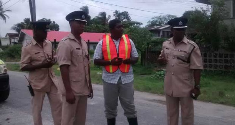 Commander Hicken, along with his officers and the engineer, having a discussion concerning rehab works to the Agricola Community Centre ground.