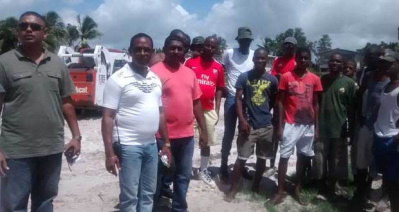 From left are OC of Police Sub-Division # 2, Deputy Superintendent Khalil Pareshram; Commander Hicken; Works Ministry Chief Engineer, and residents of Agricola