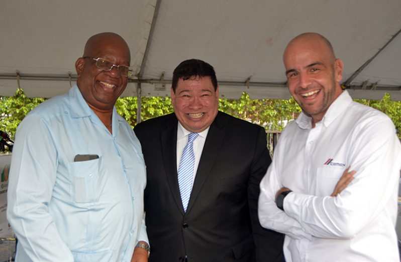 Minister of Finance, Winston Jordan, Mexican ambassador to Guyana, Ivan Medel and Yago Castro Izaguirre, General Manager of Arawak Cement Company Limited /TCL Guyana Incorporated share a light moment after the commissioning of the plant (Adrian Narine photo)