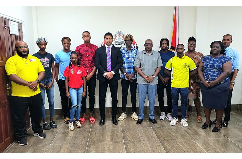 Athletes, officials, and representatives of the AAG made a courtesy call on Minister Charles Ramson Jr. prior to their departure to Bogota, Colombia for the South American U-20 Championships