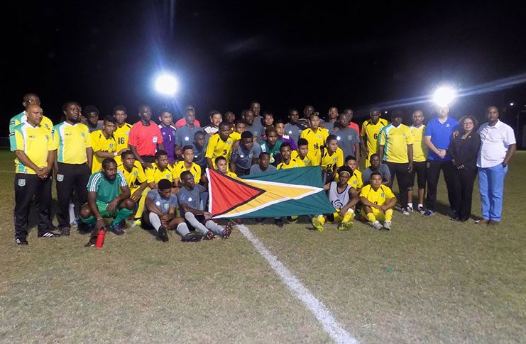 Competing teams pose after the completion of the charity game on Sunday at the Everest ground.